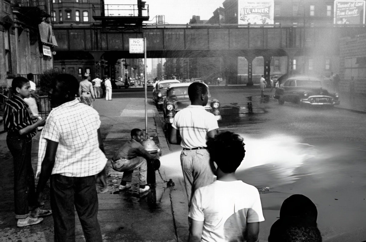 Children Cooling Down With A Fire Hydrant, Harlem, 1955.