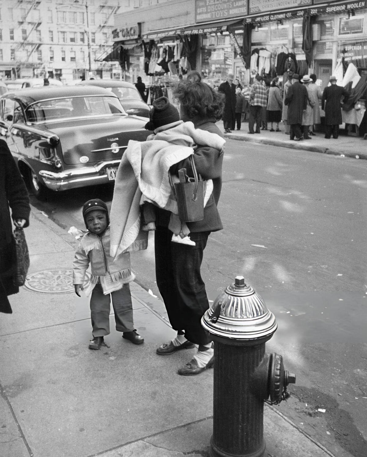 Mother With Two Children On A Harlem Street, 1956.