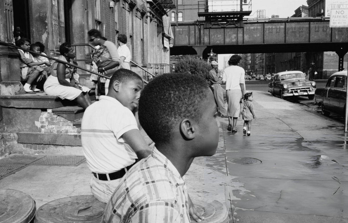 People Sitting On A Doorstep, Harlem, 1957.