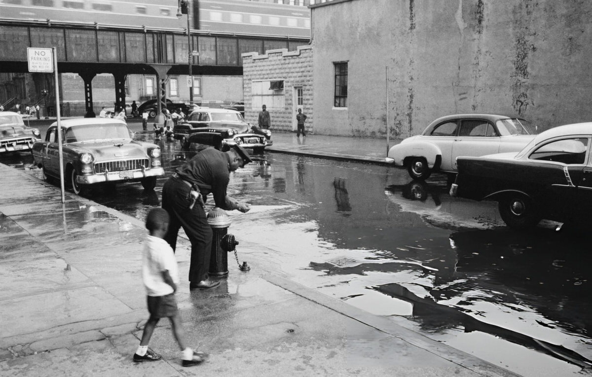 Police Officer At A Fire Hydrant, Harlem, 1957.
