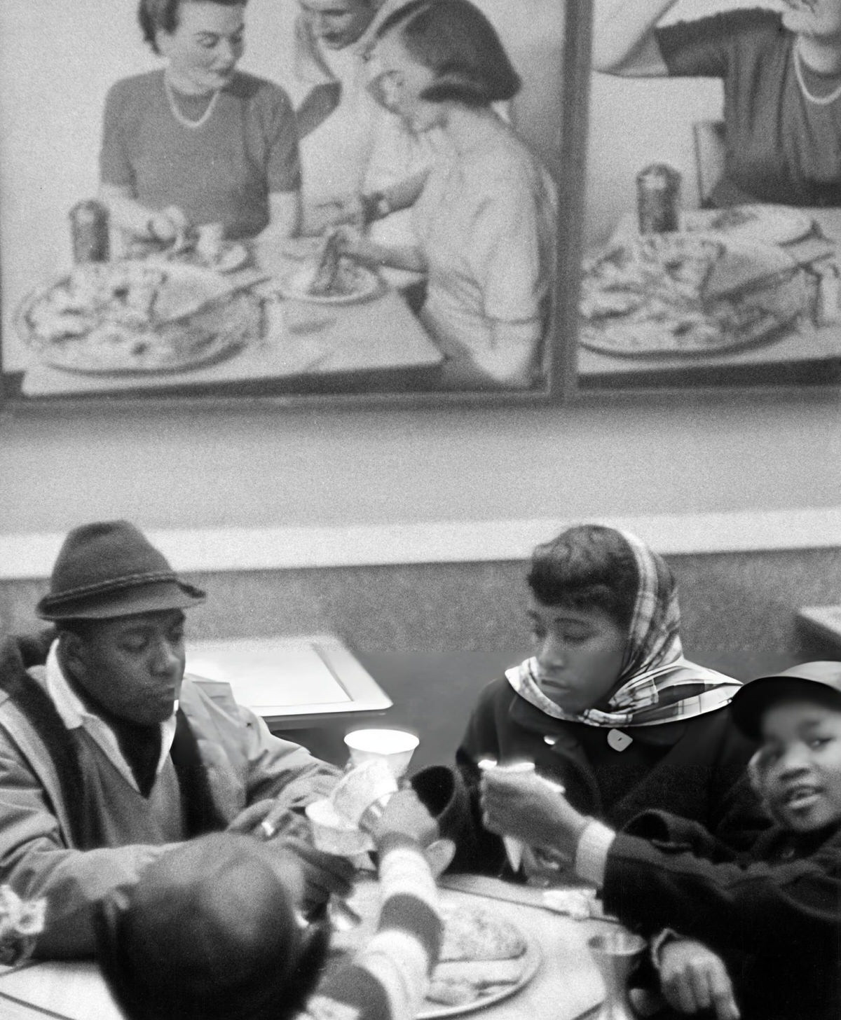 Family Having Dinner At A Harlem Restaurant, 1956.