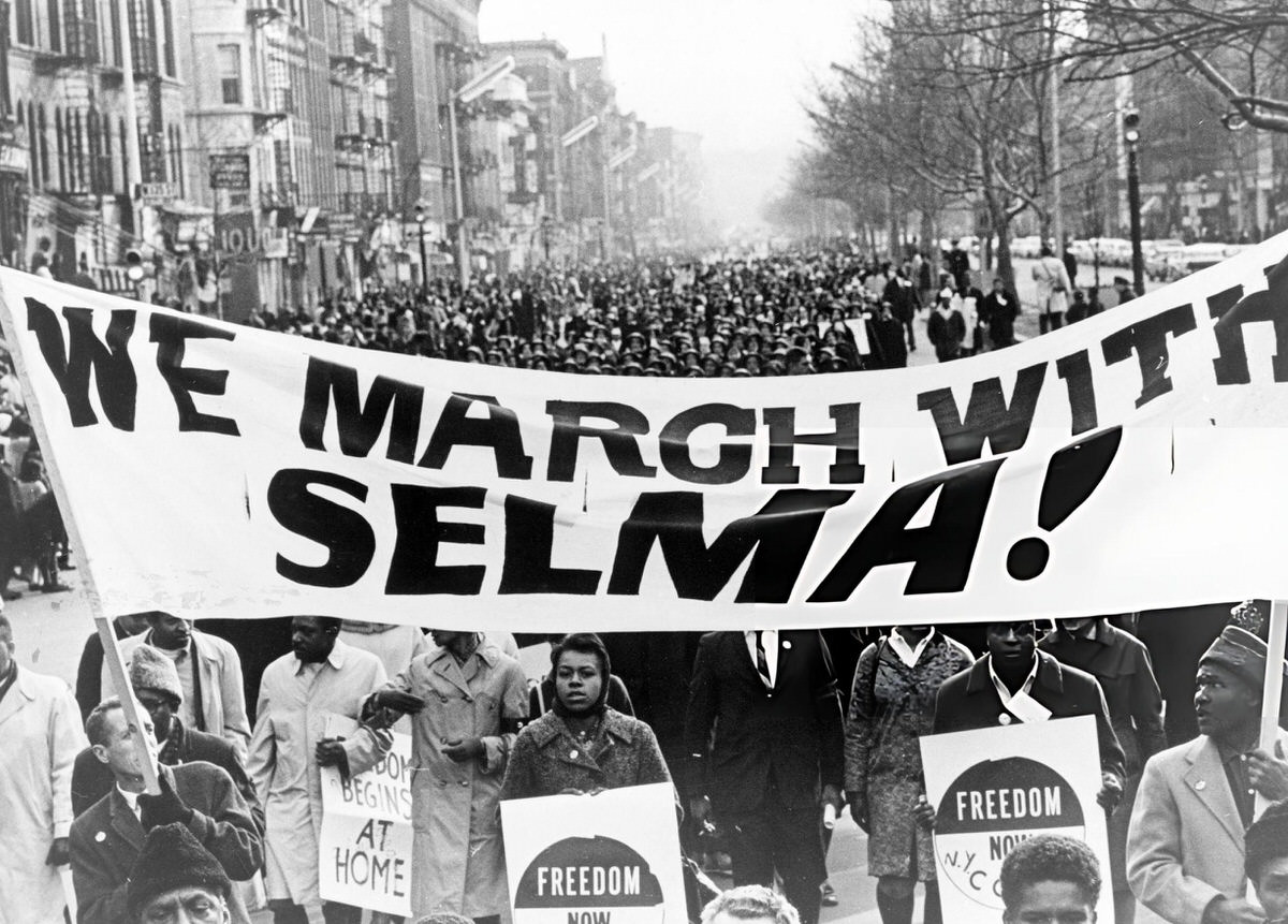 Marchers Carrying A &Amp;Quot;We March With Selma!&Amp;Quot; Banner During A Parade In Harlem, 1965.