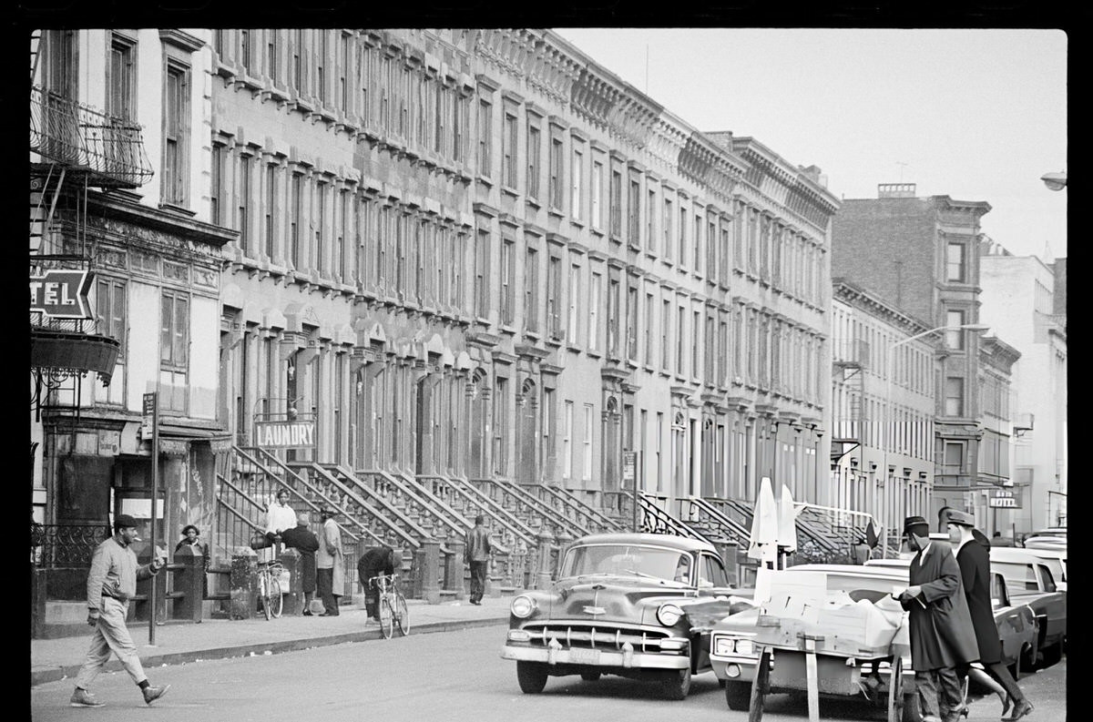 Row Houses And A Produce Stand On A Harlem Street, 1967.