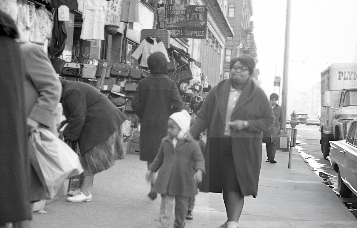 Woman And Girl Walking On A Harlem Sidewalk, 1964.