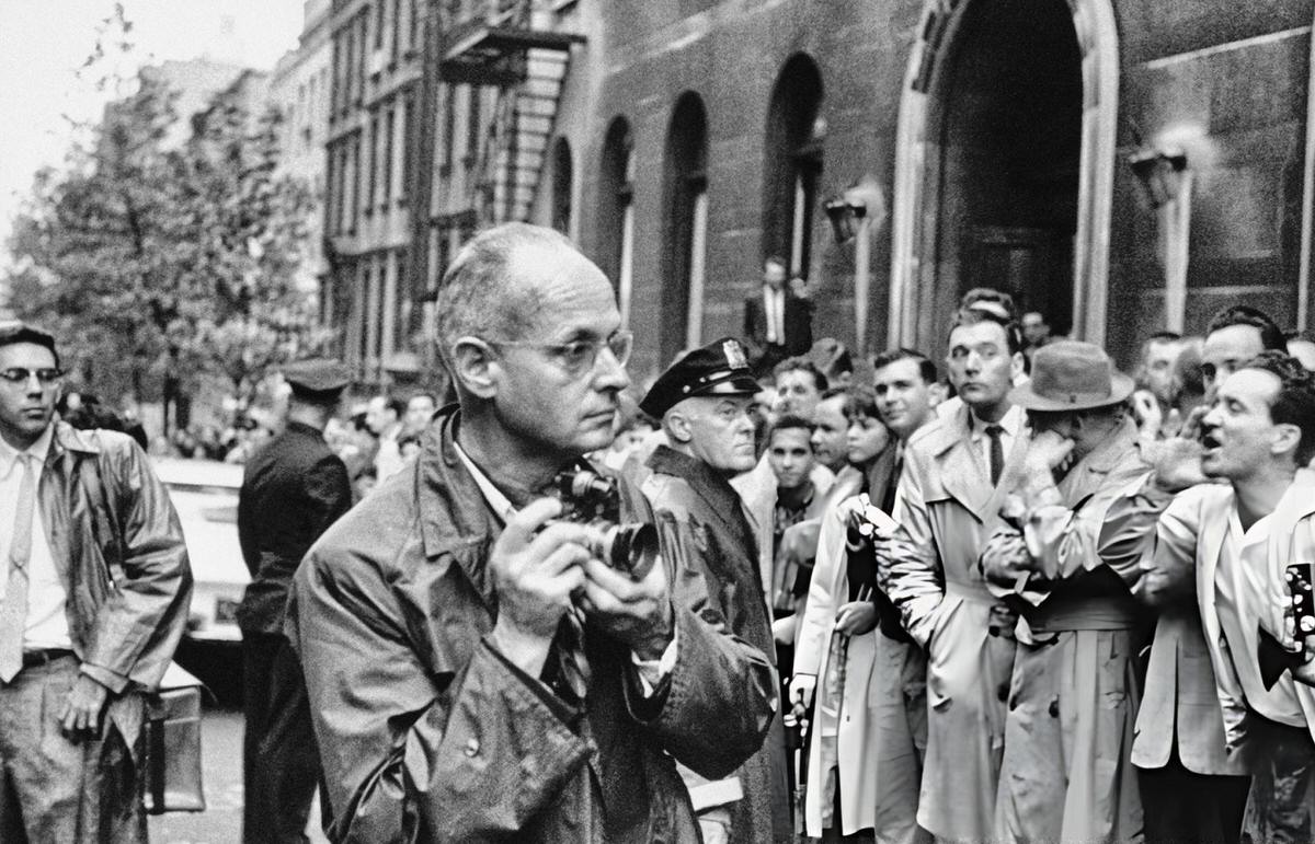 Henri Cartier-Bresson With A Crowd Outside The Hotel Theresa Waiting For Fidel Castro, Harlem, 1960.