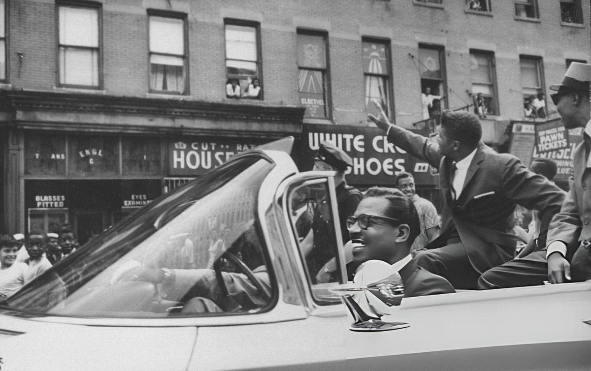 Heavyweight Champion Floyd Patterson Being Welcomed By Fans In Harlem.