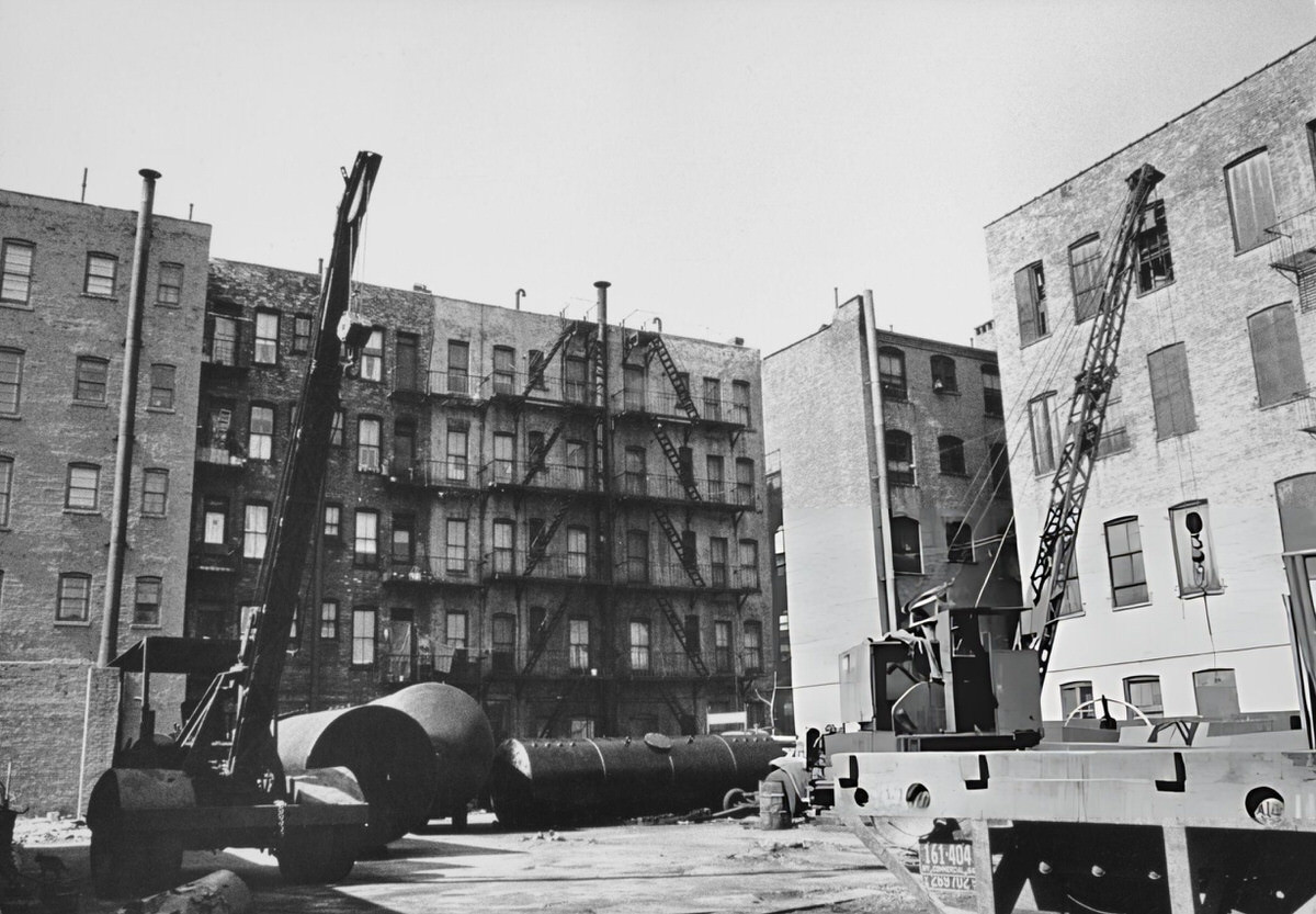 Tenement Buildings Surrounding Machinery At A Former Ironworks, Harlem, 1965.