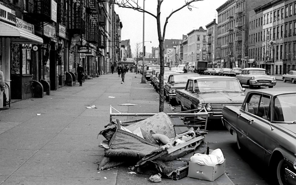 Abandoned Mattress And Bed Frame On A Harlem Sidewalk, 1963.