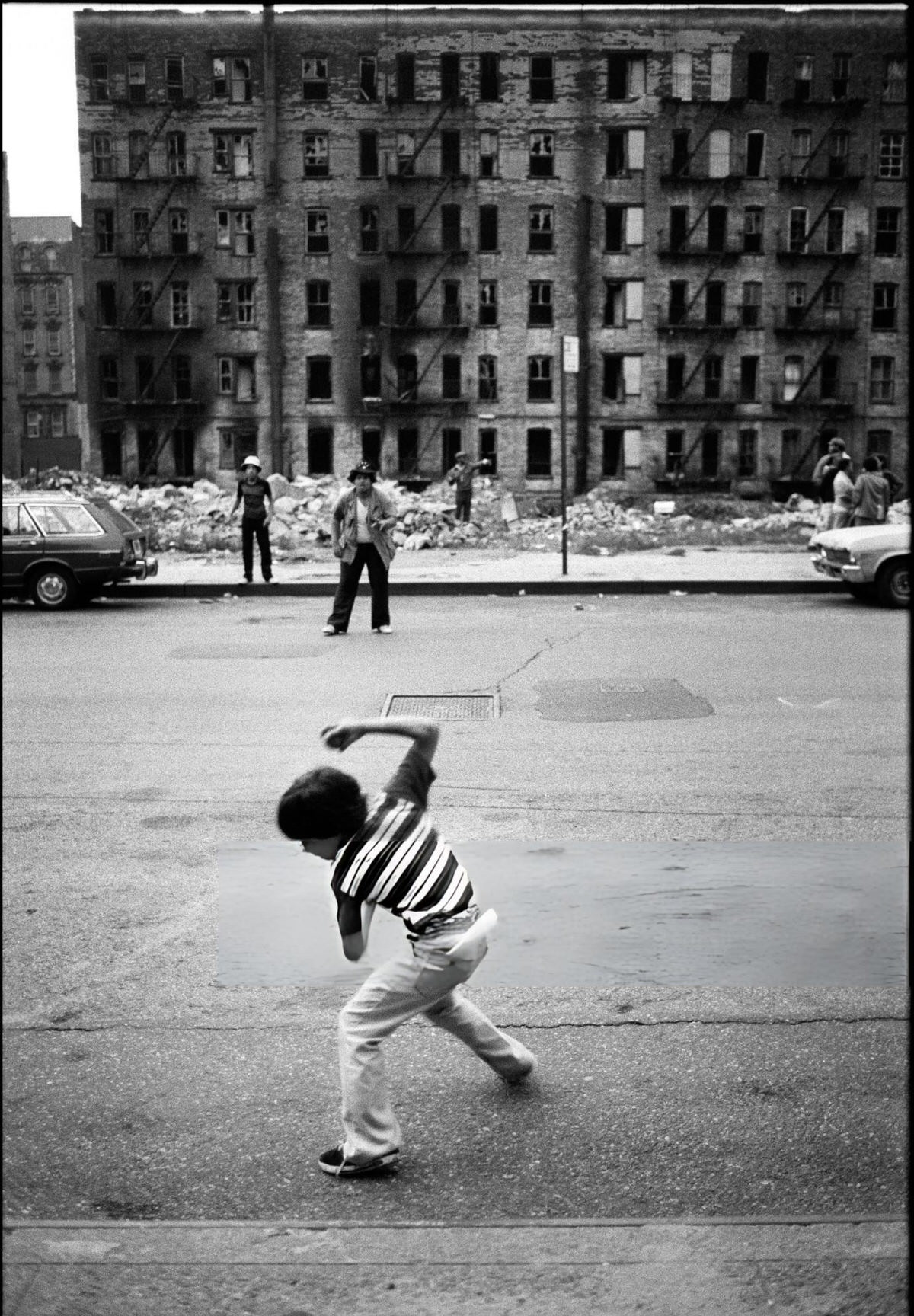 Boy Preparing To Play Curb Ball In Spanish Harlem, 1978.