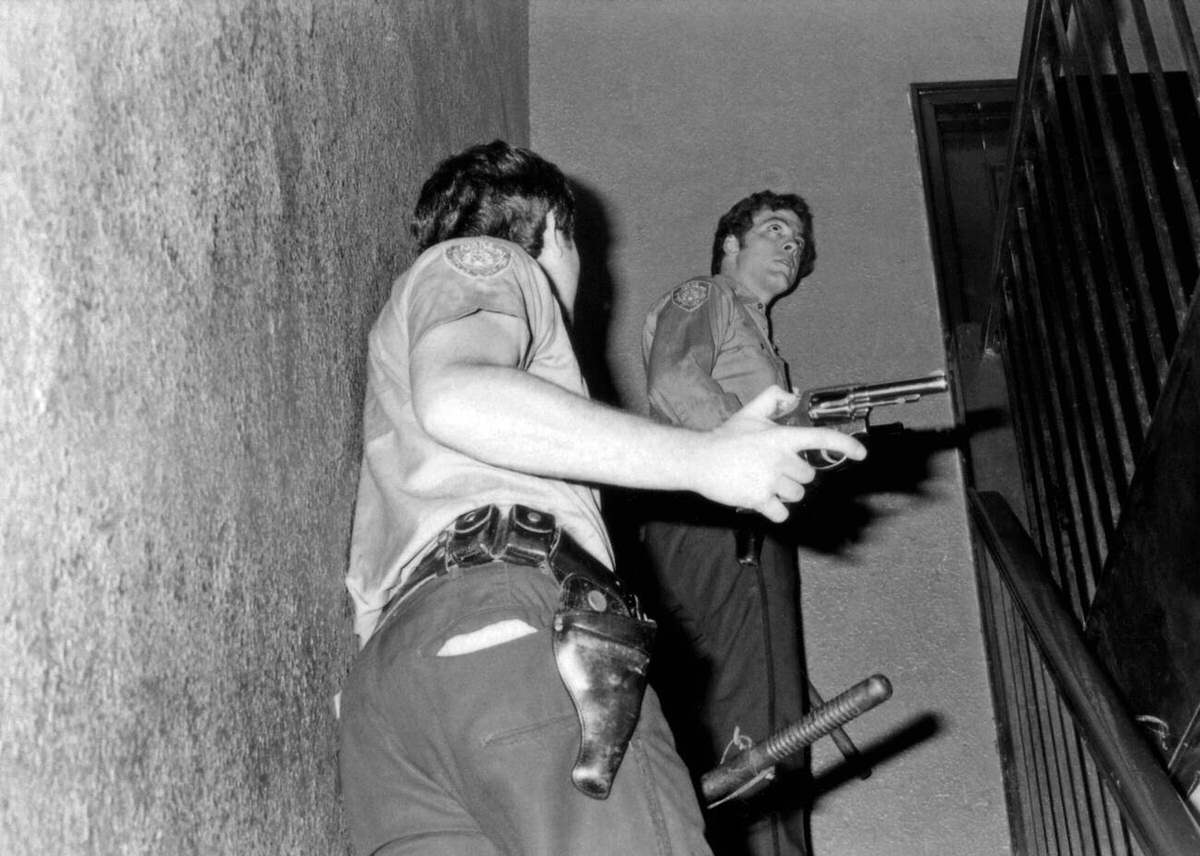 Police Officers From The 28Th Precinct With Guns Drawn, Harlem, 1977.