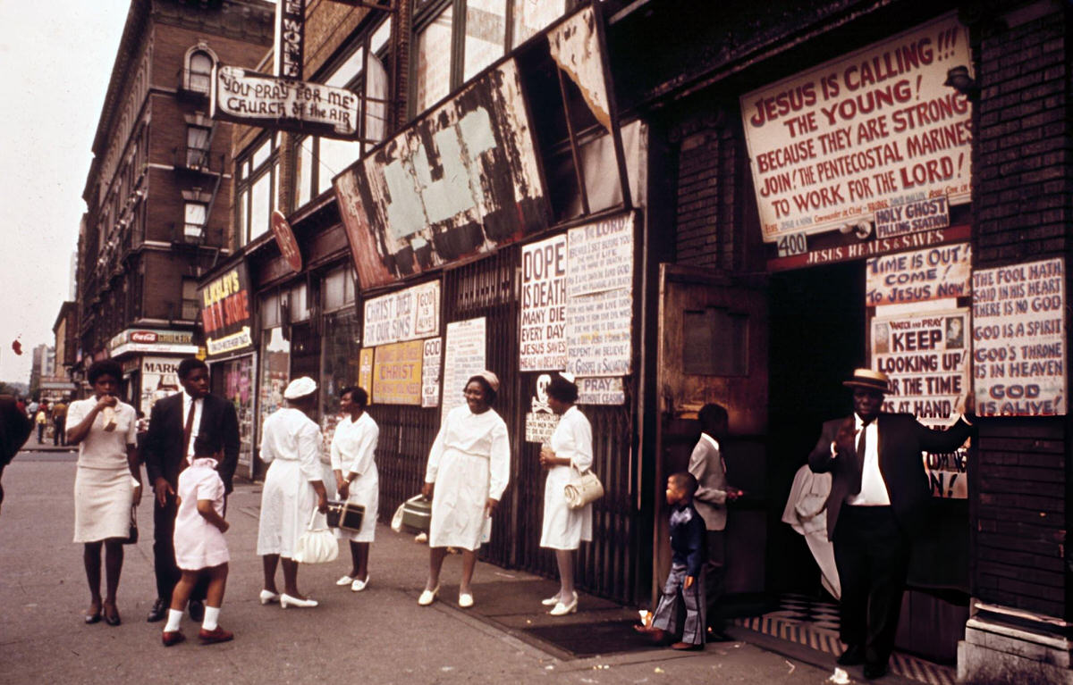 Women Dressed In White Standing Before A Pentecostal Church, Harlem, 1970.