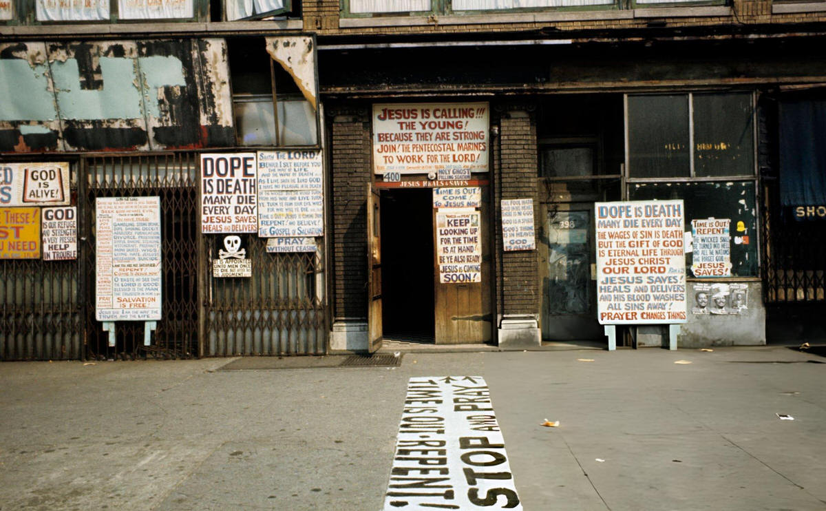 Pentecostal Propaganda Signs Regarding Drug Use Outside A Local Center, Harlem, 1970.