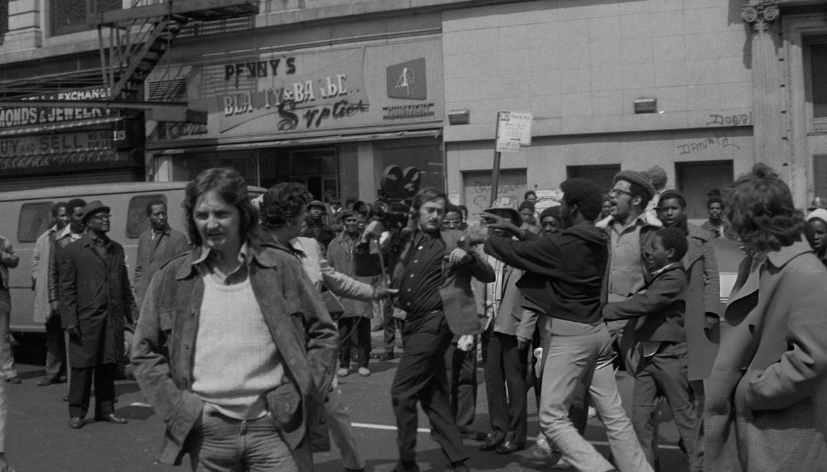 Scuffle Between Youth And A Television Crew Outside The Nation Of Islam Mosque No. 7, Harlem, 1972.