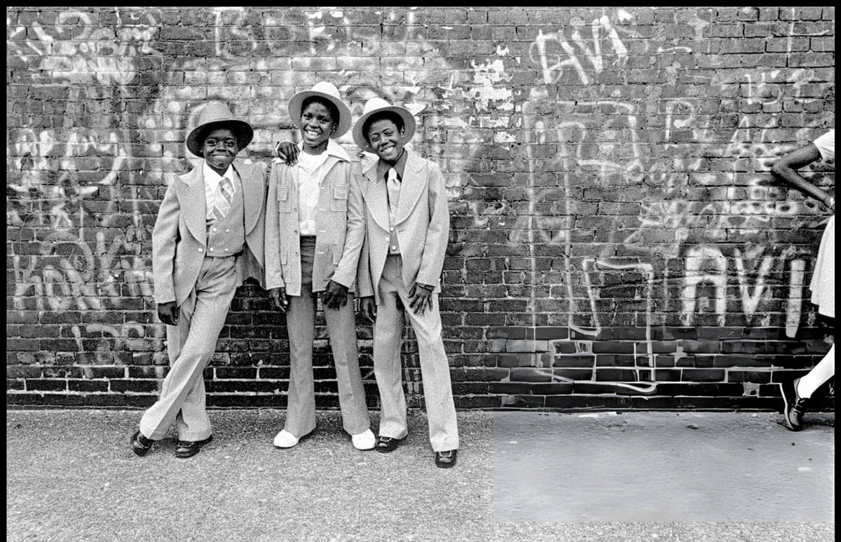Three Well-Dressed Boys Posing On A Harlem Street, 1975.