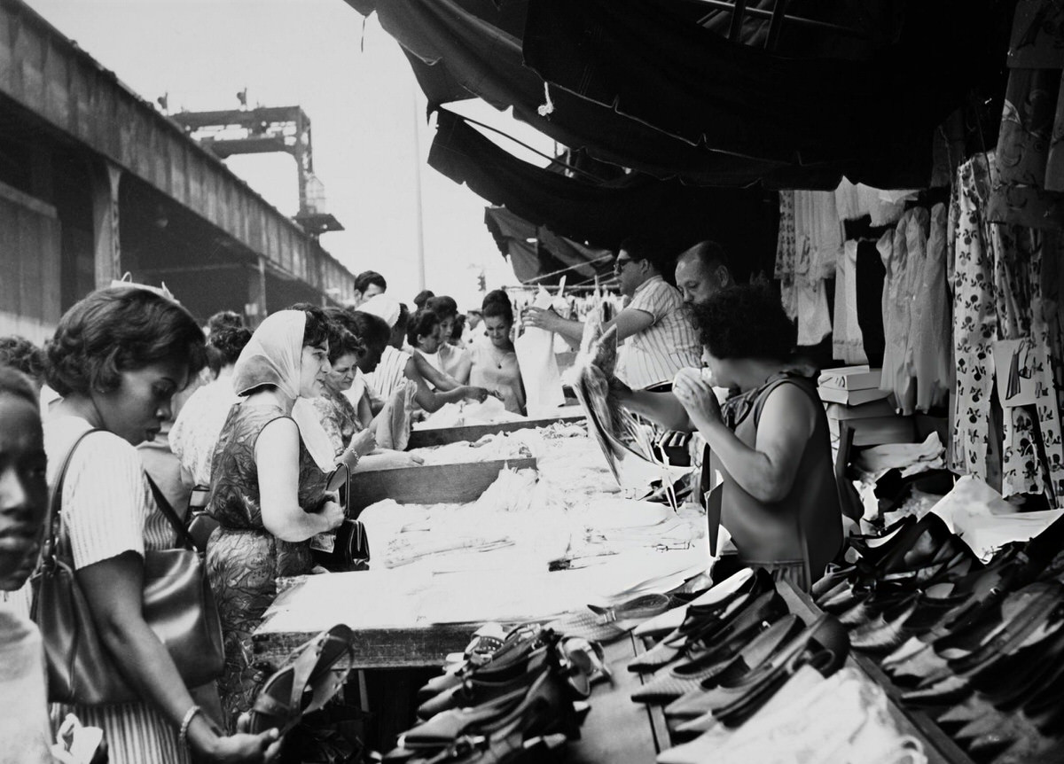 Shoppers At A Womenswear Stall, Harlem, 1975.
