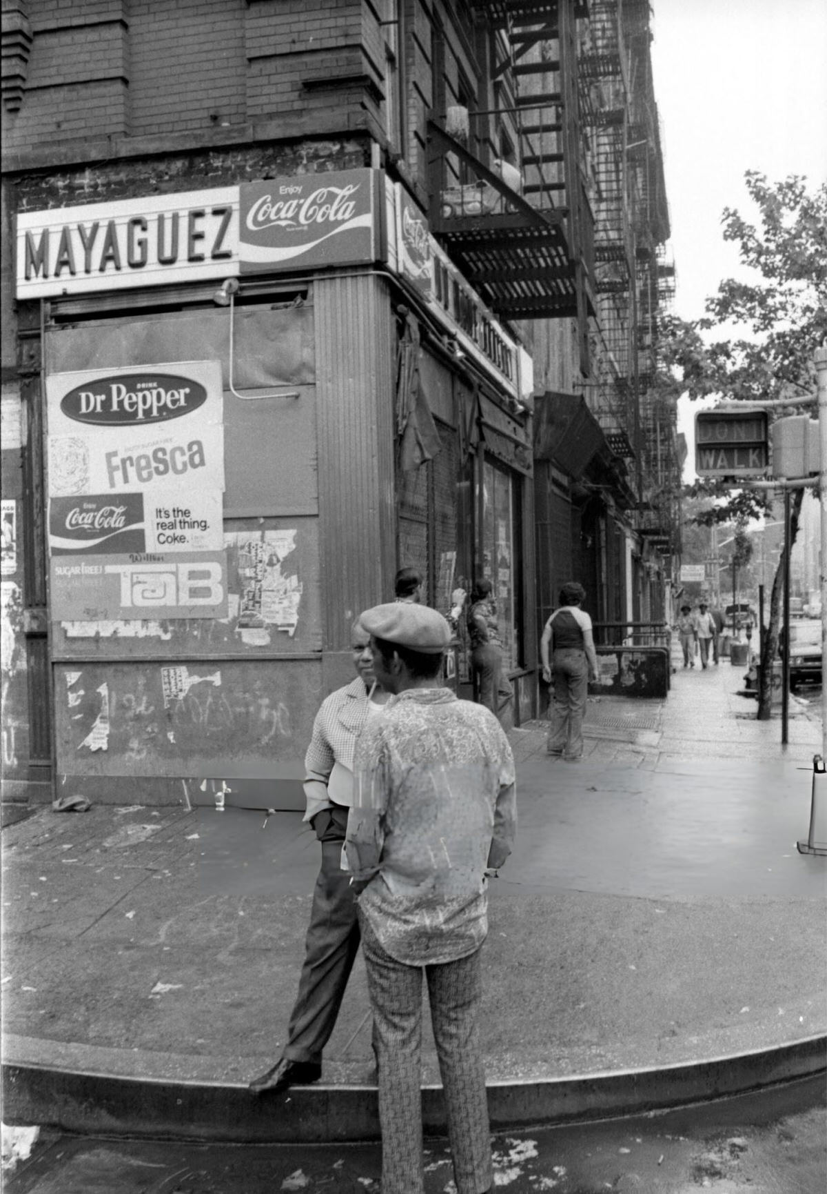 Two Men Standing On A Harlem Street Corner, 1975.