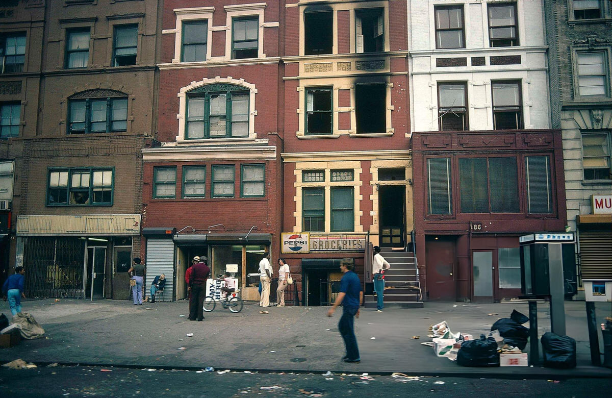 Passersby Outside A Grocery Store In Harlem, 1981.