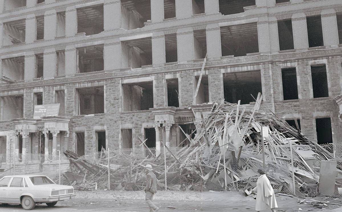 Pedestrians Walking Past A Vacant Building At 135Th Street And Adam Clayton Powell Jr. Boulevard, Harlem.