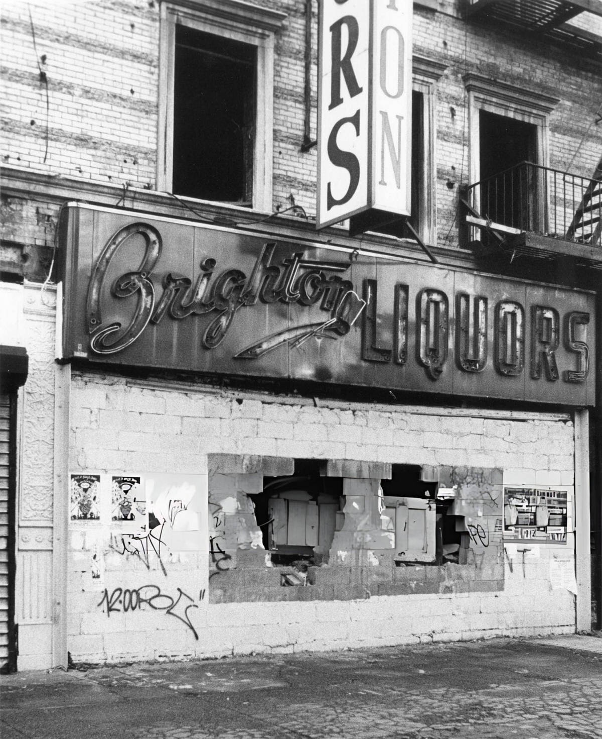 Gutted Building With A Brighton Liquors Sign, Harlem, 1985.