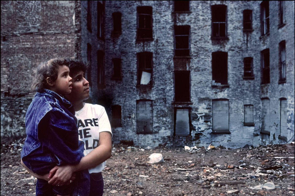Woman Holding A Child In A Vacant Lot In Spanish Harlem, 1985.