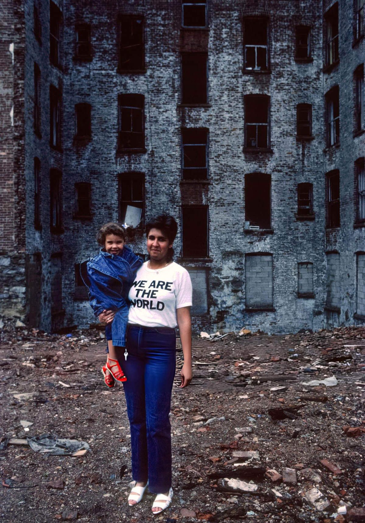 Woman Holding A Child In A Vacant Lot In Spanish Harlem, 1985.