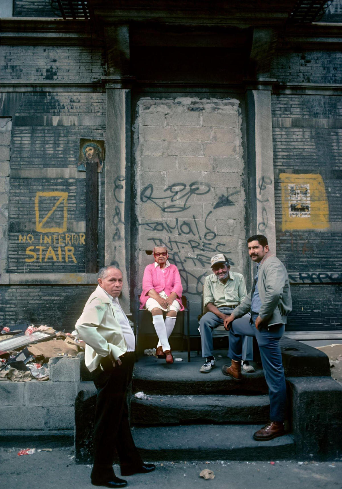 Group Of People On The Stoop Of An Abandoned Building In Spanish Harlem, 1985.