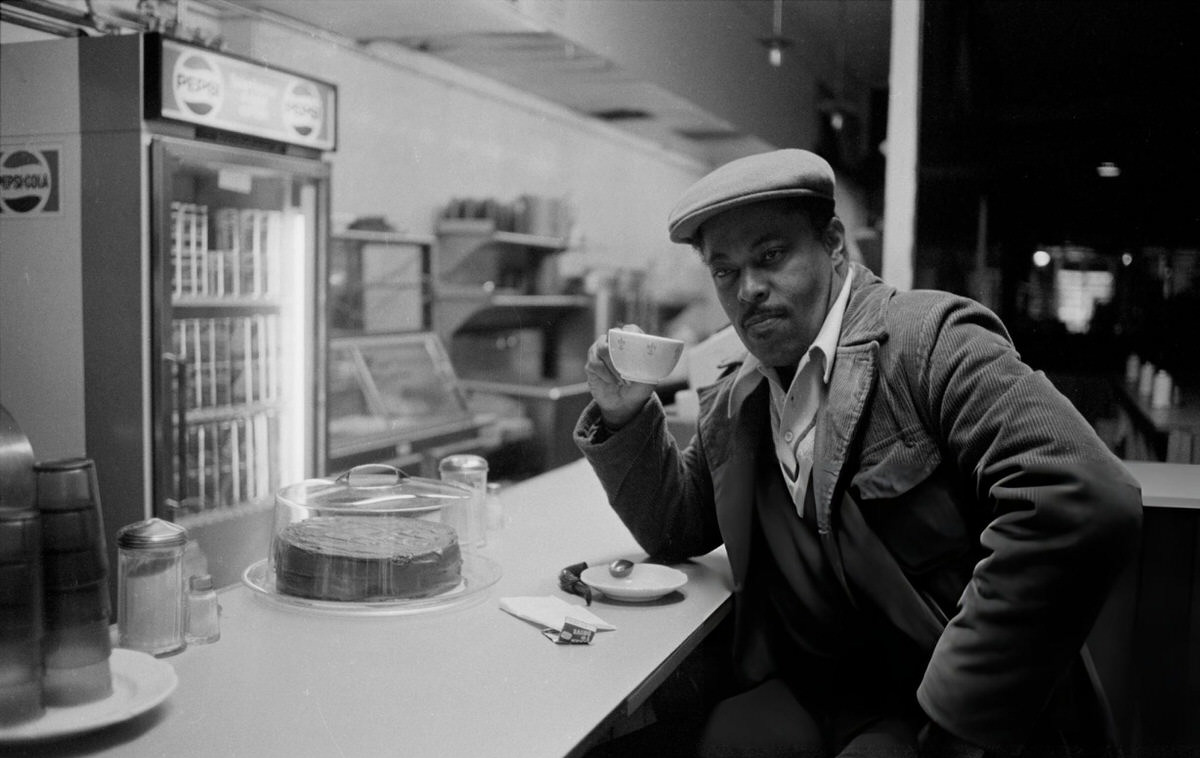 Street Artist Franco Gaskin In A Harlem Cafe, 1980.