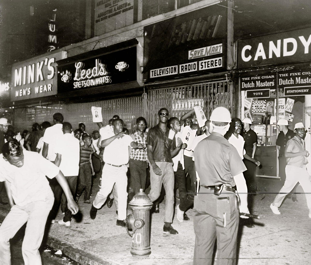 Rioters In Harlem Carrying Pictures Of Lieutenant Gilligan Following The Fatal Shooting Of James Powell, 1964.