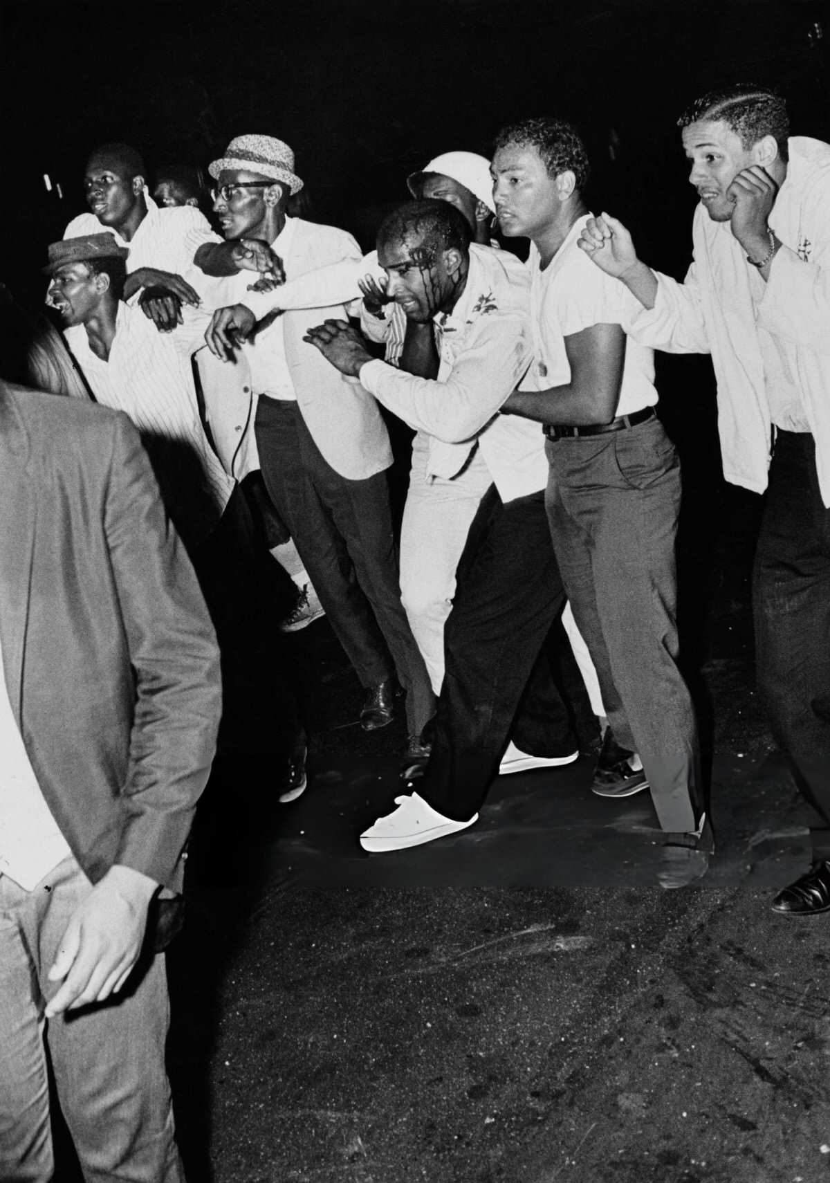 Men Rescuing An Injured Friend During The Harlem Riots, 1964.