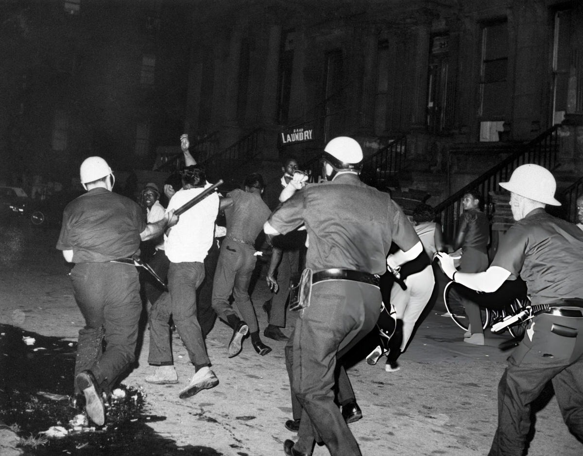 Police Dispersing A Crowd On A Harlem Street During The 1964 Riots.