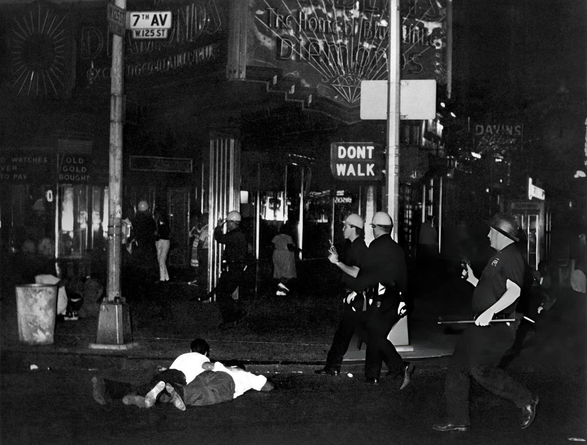 Police Officers With Guns Aimed At Rooftops During The Harlem Riots, 1964.