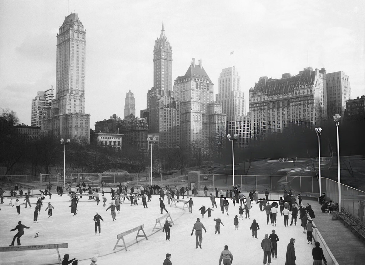 Skaters At The Wollman Rink In Central Park With The Manhattan Skyline In The Background, New York, 1951.