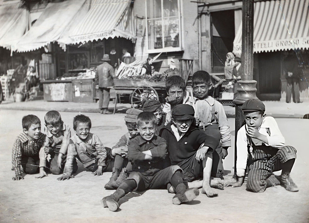 Boys Sitting In The Street At Mulberry Bend, 1897.