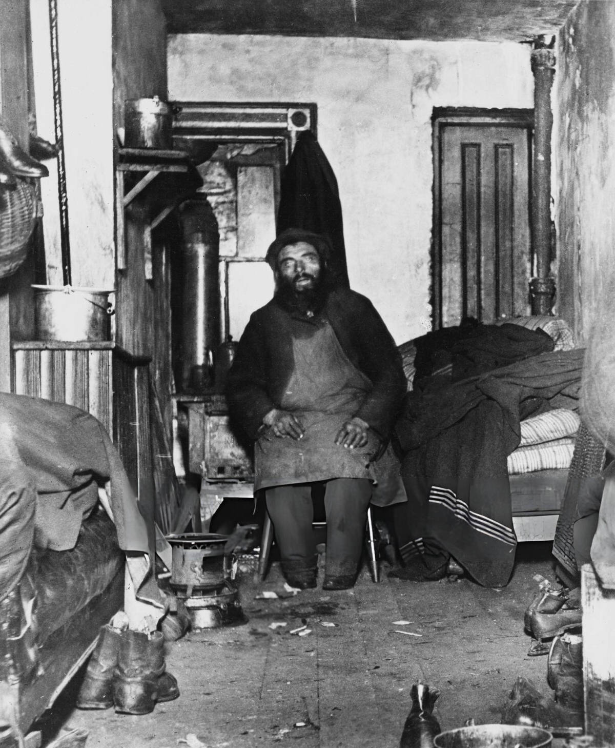 Immigrant In A Tenement Room At Mulberry Bend, Manhattan, 1890.