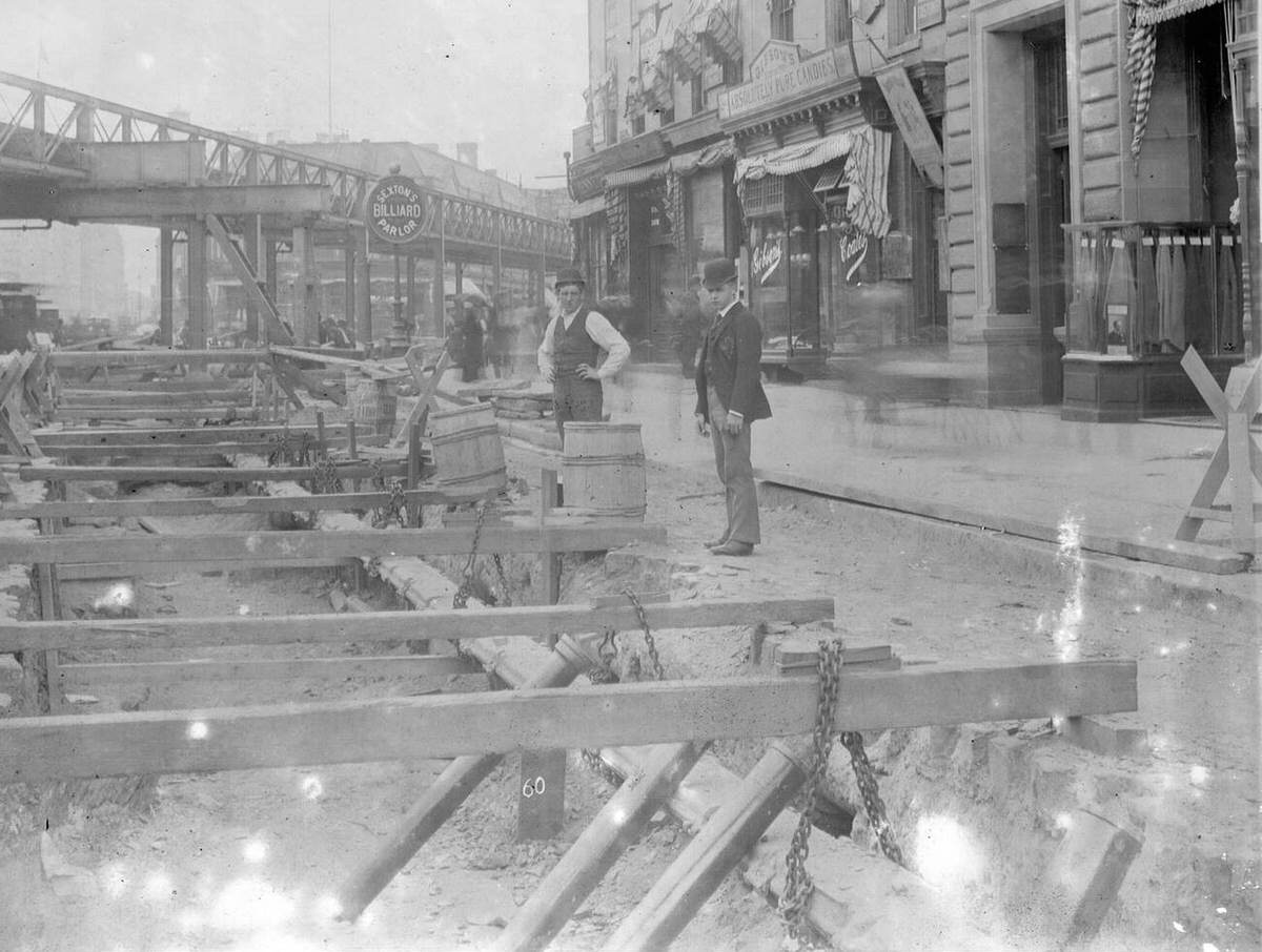 Men Observing Subway Construction Equipment On A Street, New York, 1901.