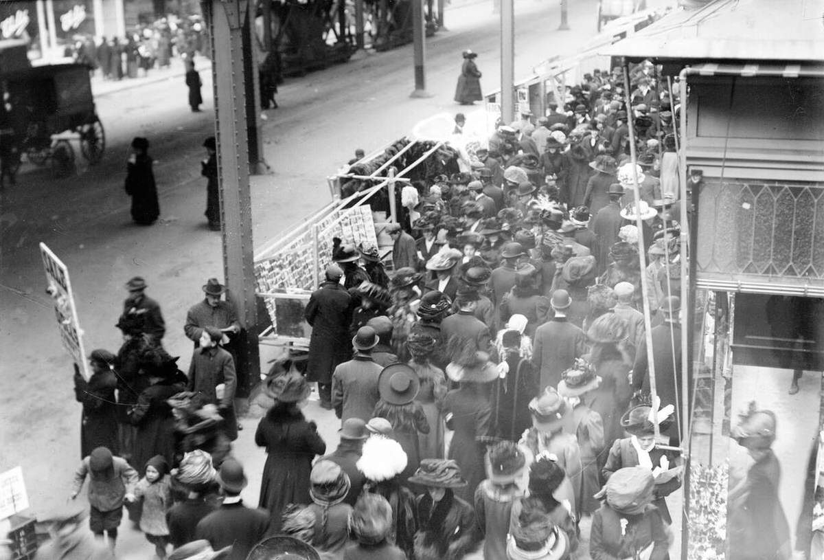 Crowds Shopping Under Elevated Train Tracks, New York, 1910.