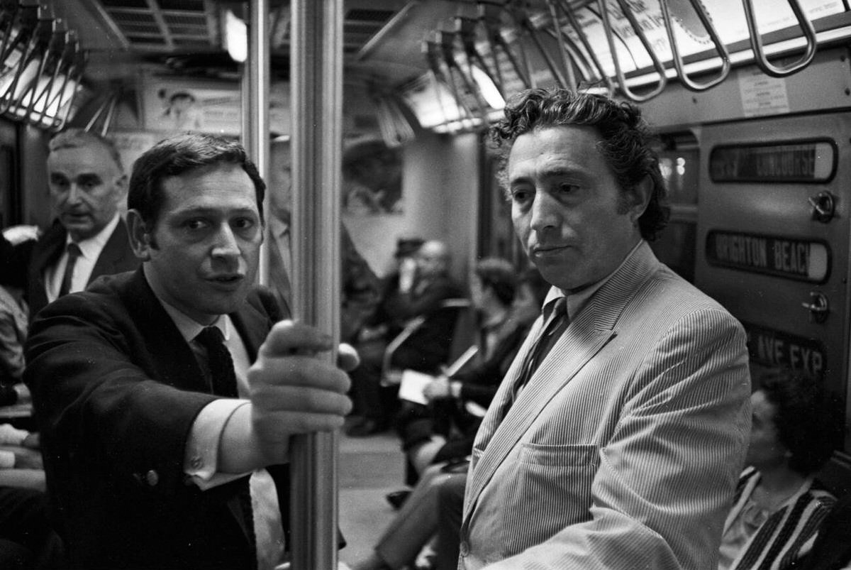 Photographers Allyn Z. Baum And Tony Vaccaro On A Subway, New York, 1969.