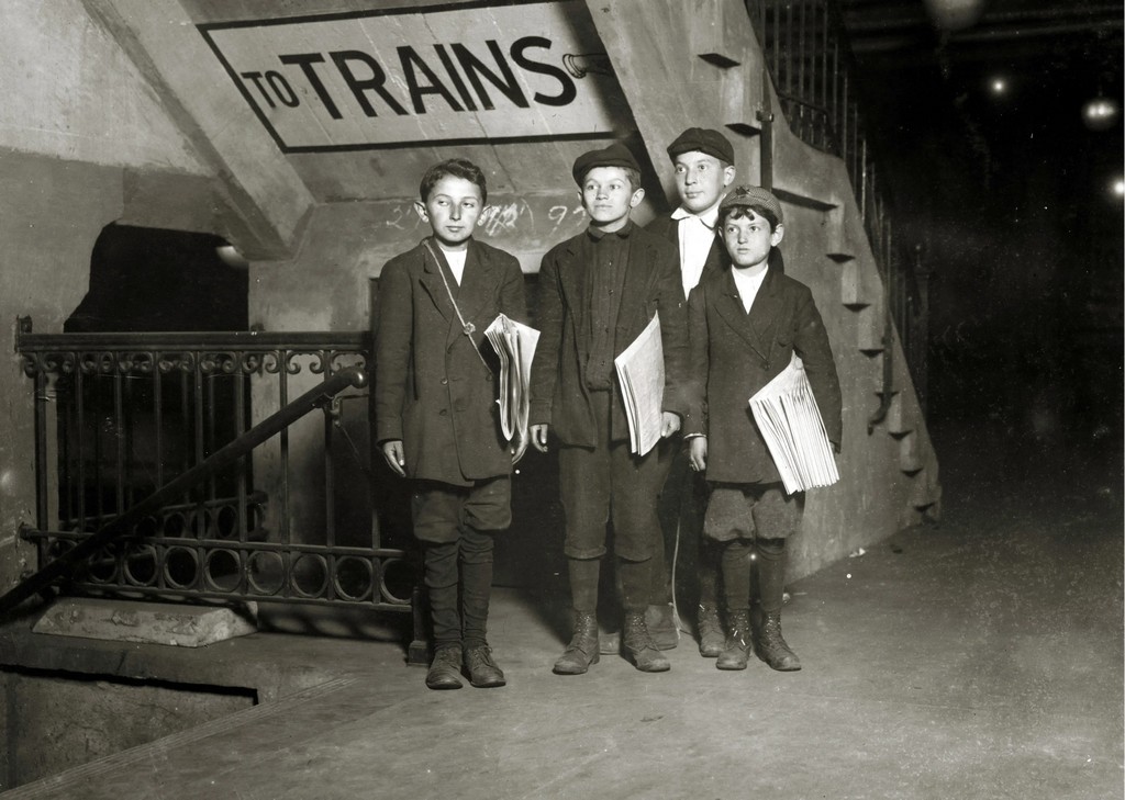 Young Boys Were Often Seen Near The Subway Stations Selling Newspapers