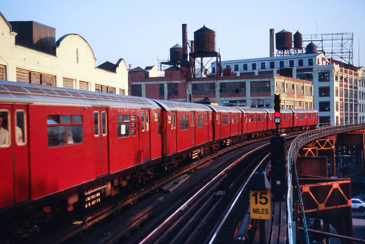 No. 7 Redbird Subway Train On Elevated Tracks, Queens, 1995.