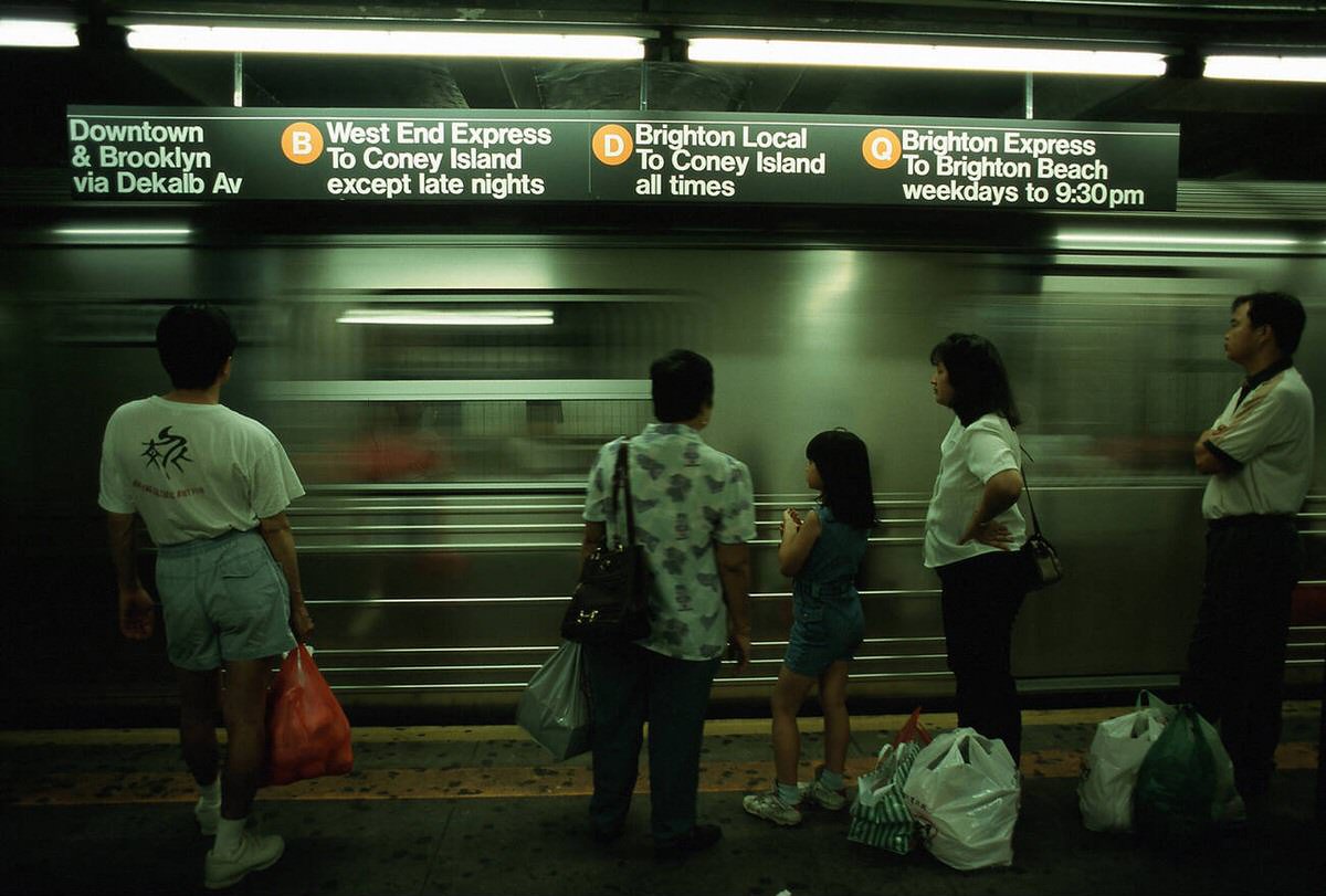 Passengers Waiting In A Subway Station, New York, 1999.