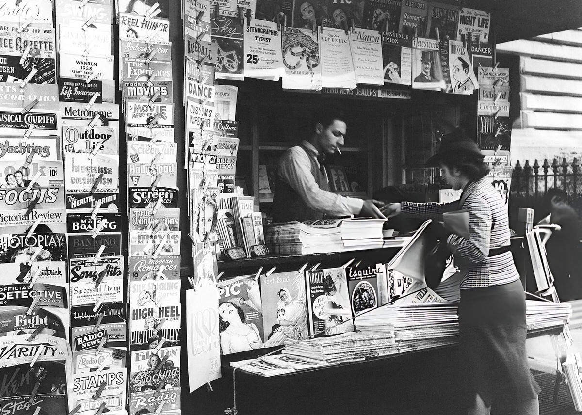 Woman Buying A Magazine At A Newsstand On 5Th Avenue And 42Nd Street, New York, 1938.