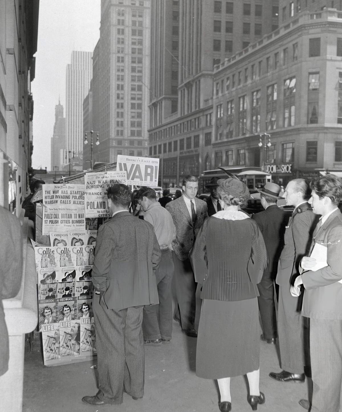 Passersby Reading Headlines About The Invasion Of Poland And The Start Of World War Ii, New York, 1939.