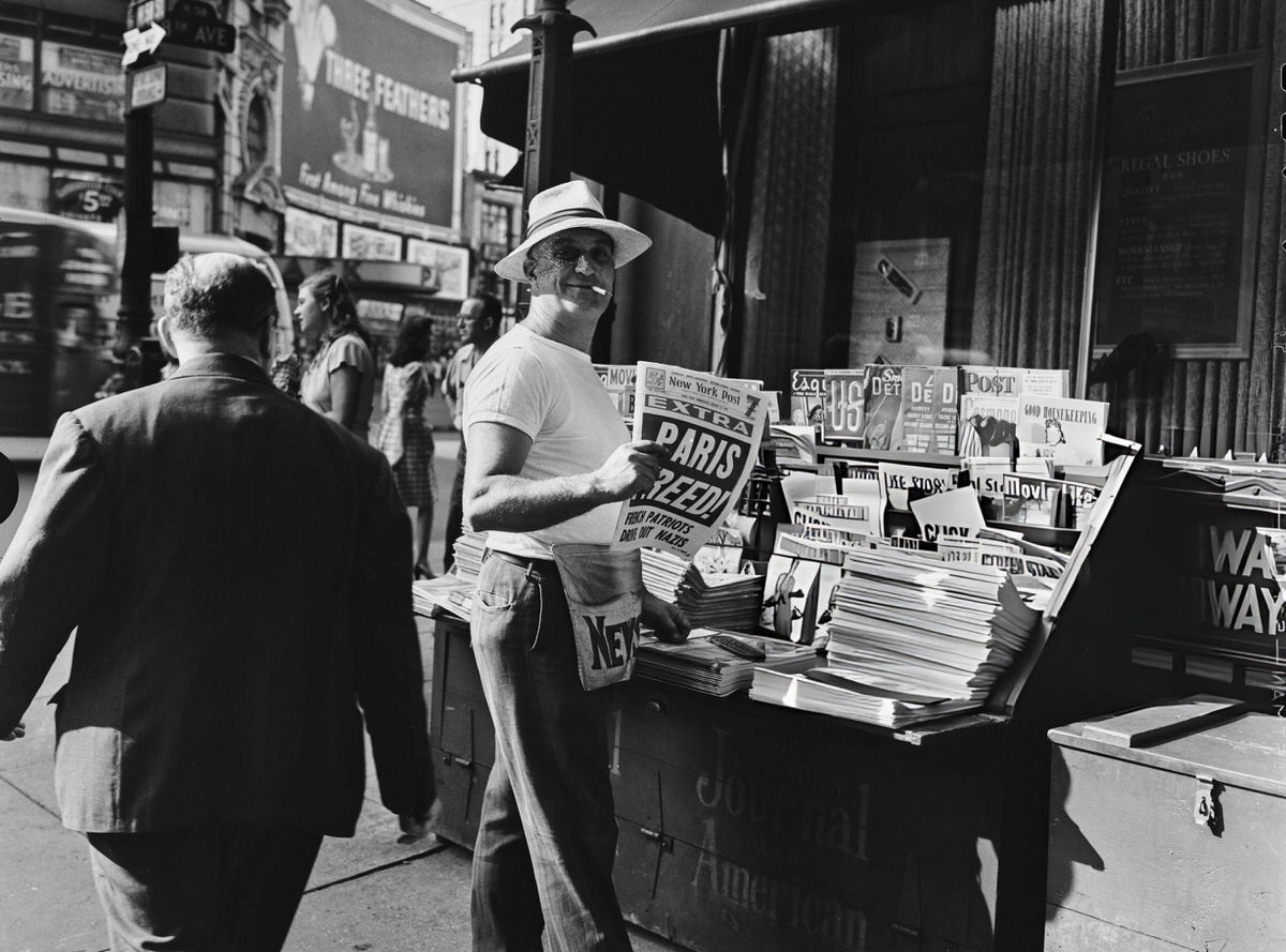 Newsstand During World War Ii With A Headline Announcing The Liberation Of Paris, New York, 1944.