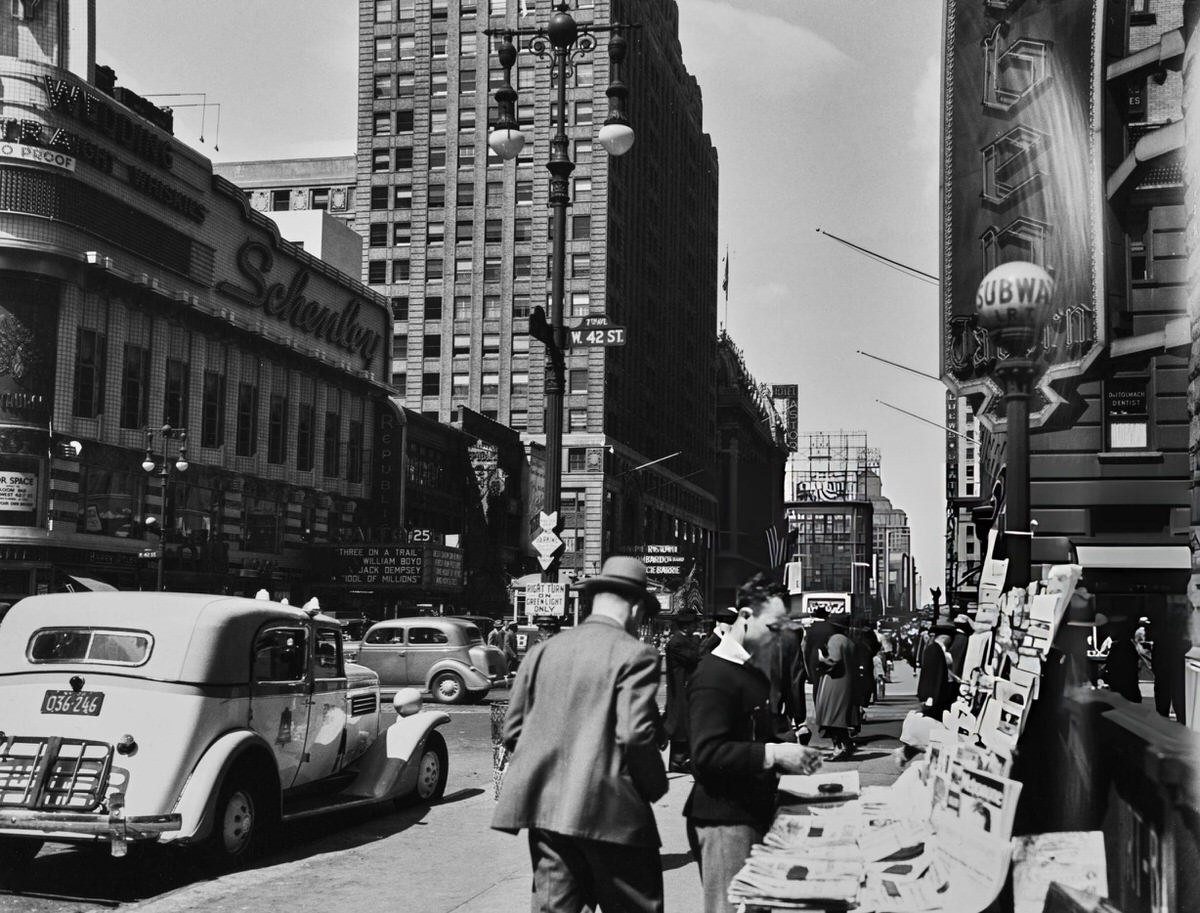 Traffic And Pedestrians In Times Square Near A Schenley Sign, Midtown Manhattan, 1945.