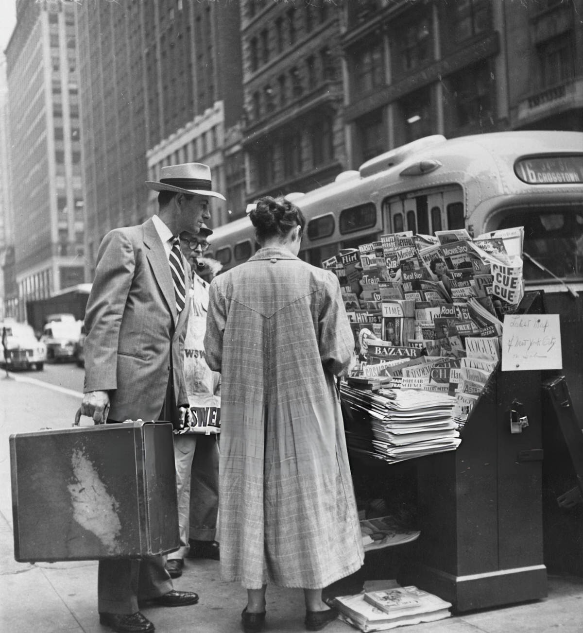 Salesman Stuart Lloyd At A Newsstand, New York, 1949.