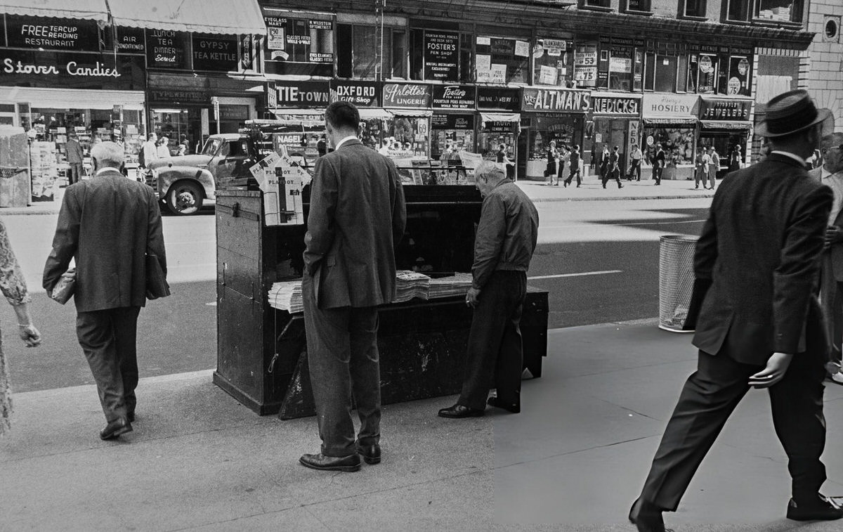 Customer At A Newsstand Near The Gypsy Tea Kettle And Mrs. Altman'S Strudel Shop, New York, 1950.