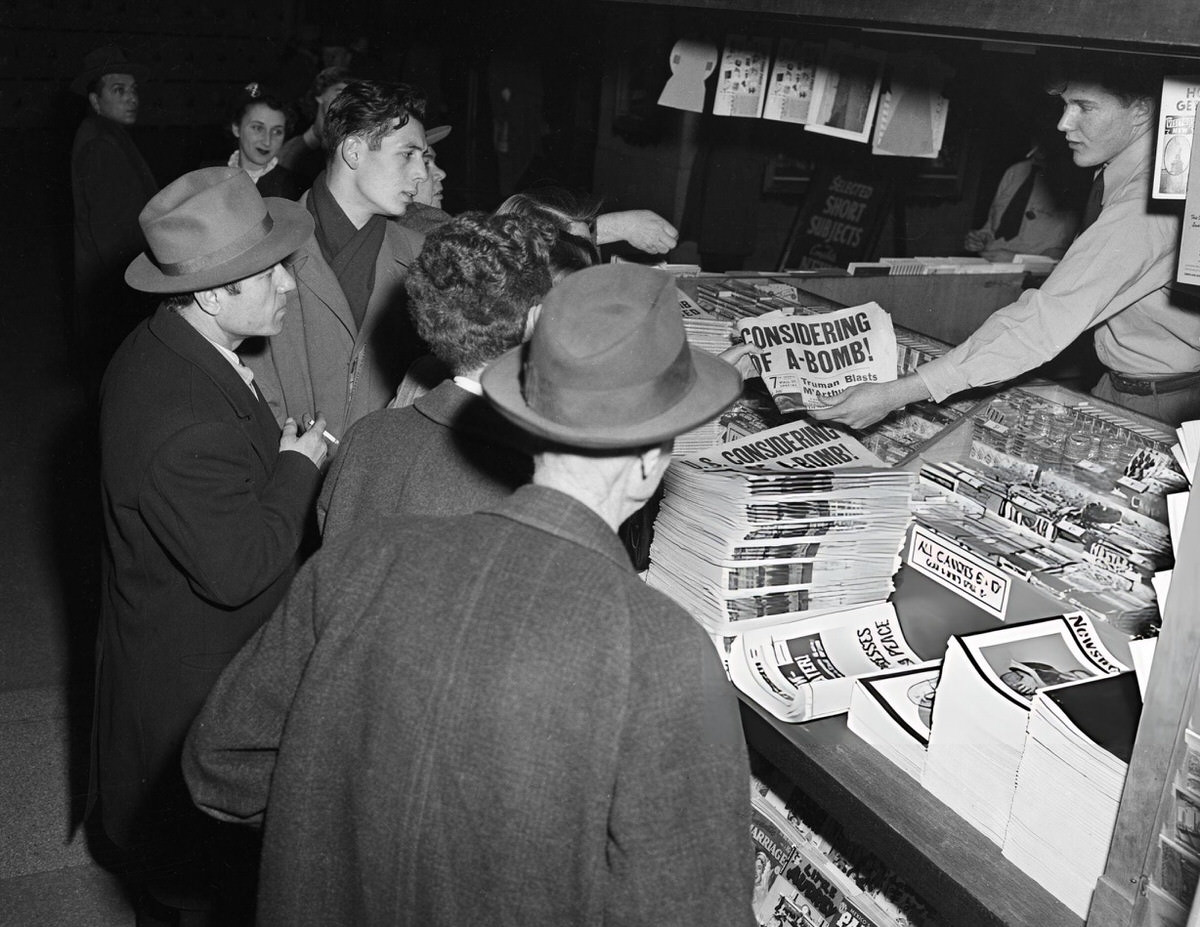 Soldiers Reading Atomic Bomb Headlines At A Grand Central Station Newsstand, New York, 1950.