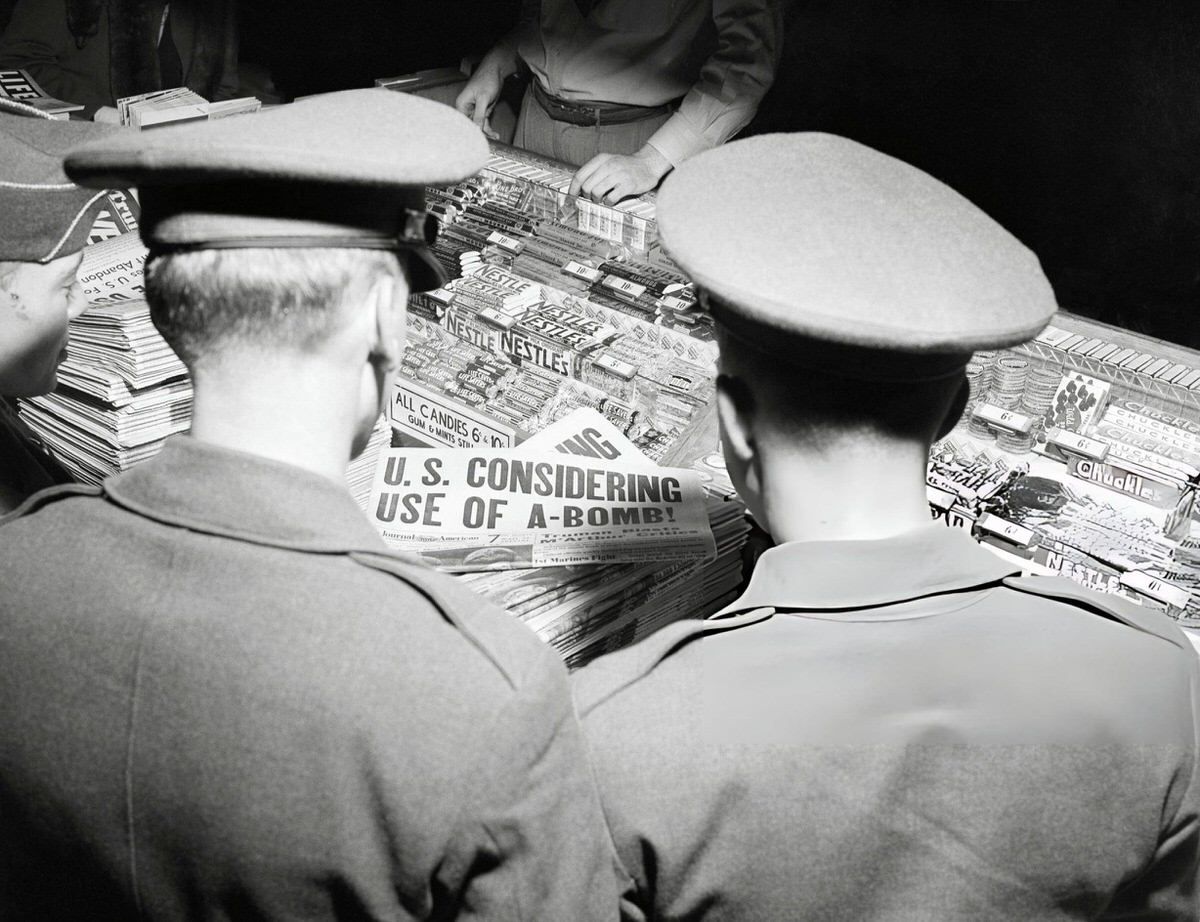 Soldiers Reading Atomic Bomb Headlines At A Grand Central Station Newsstand, New York, 1950.