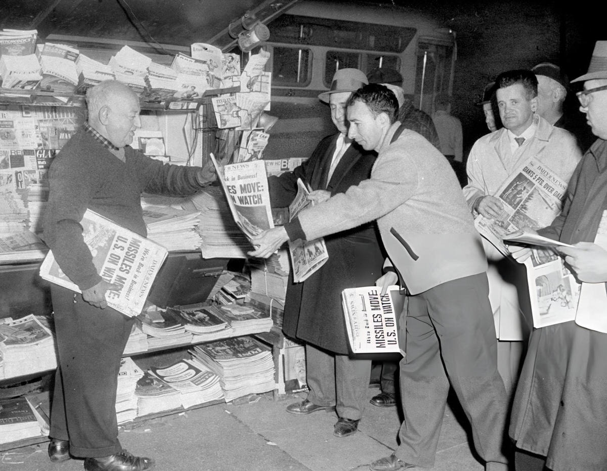 People Gathering At A Newsstand To Purchase The Daily News After A Strike, New York, 1962.