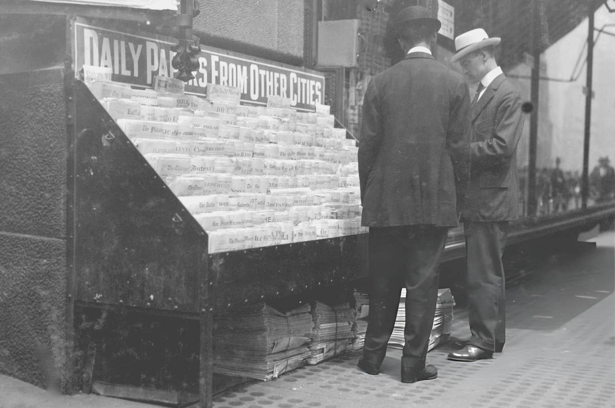 Men At A Newsstand Featuring Daily Papers From Other Cities, New York, 1913.